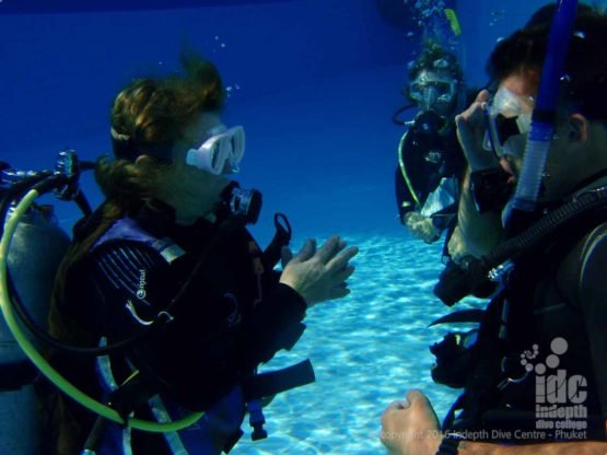 PADI Open Water Scuba Instructor (OWSI) with Candidates in the pool on Phuket