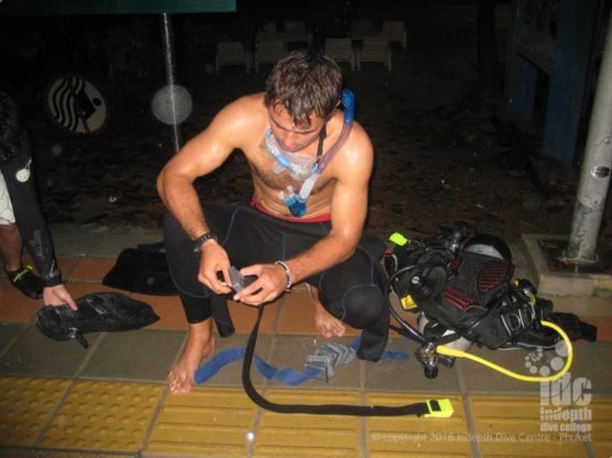 PADI Night Diver student getting ready for Phuket beach Night dive