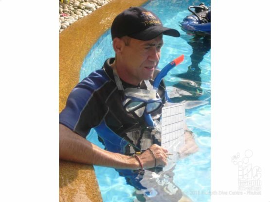 Chris Owen, Indepth Dive Centre PADI Course Director, grading IDC presentations in the pool