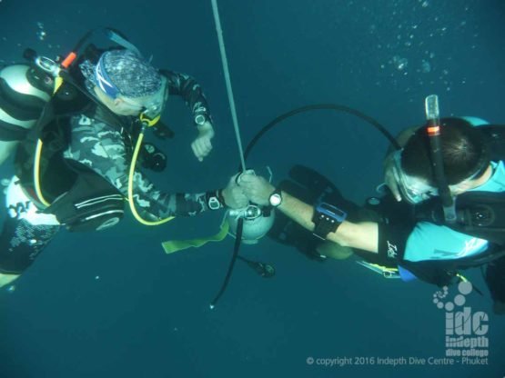 PADI Deep Specialty Instructor course divers on their simulated Emergency Deco Stop