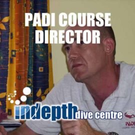 Our PADI Course Director Chris Owen listening to a classroom teaching presentation
